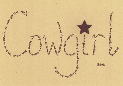 Cowgirl written in hand-printed Bible verses in burgundy ink on brown paper with rustic metal star embellishment